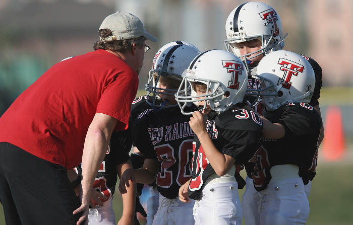 Kids playing after school football